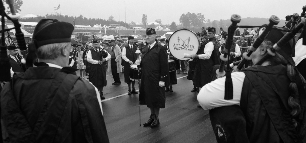 American Petit LeMans - the Atlanta Pipe Band. Nikon FA - Kodak CN400
