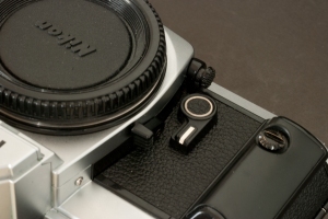 Nikon FA (the round knob controlling the exposure mode ( matrix or center weighted) is on the right side of the lens mount, at the top on this picture