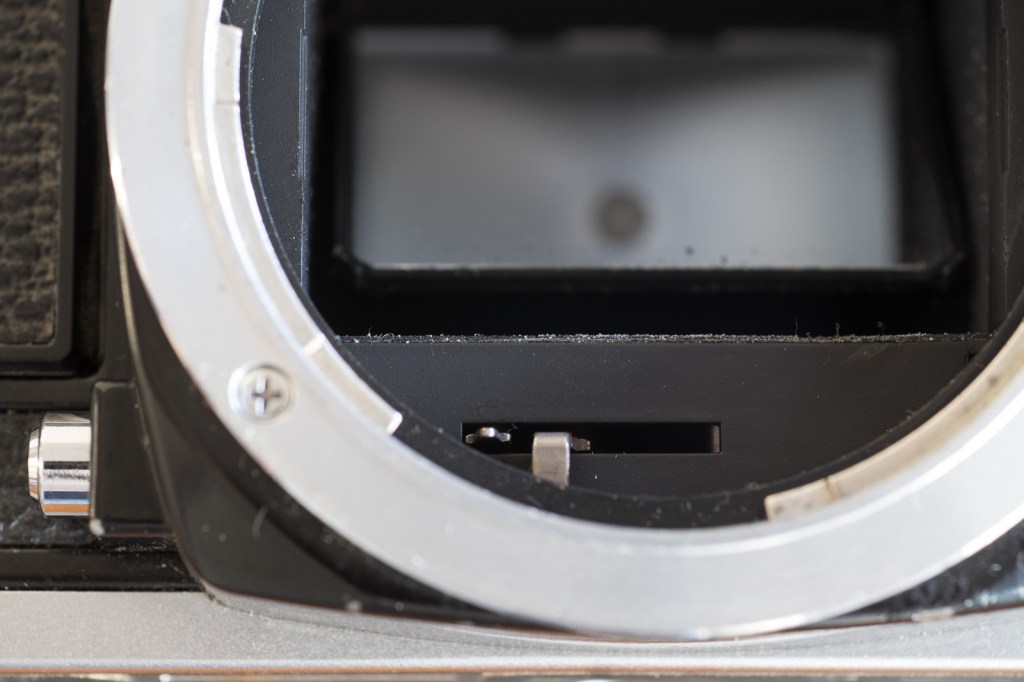 Fujica AX-3 - the bayonet is designed to support stopped down metering with 42mm screw mount lenses (the lever on the right controls the diaphragm of a Fujinon bayonet lens, the lever on the left controls the stop down mechanism of 42mm screw mount lenses (if mounted with the Fujica 42mm to X adapter).